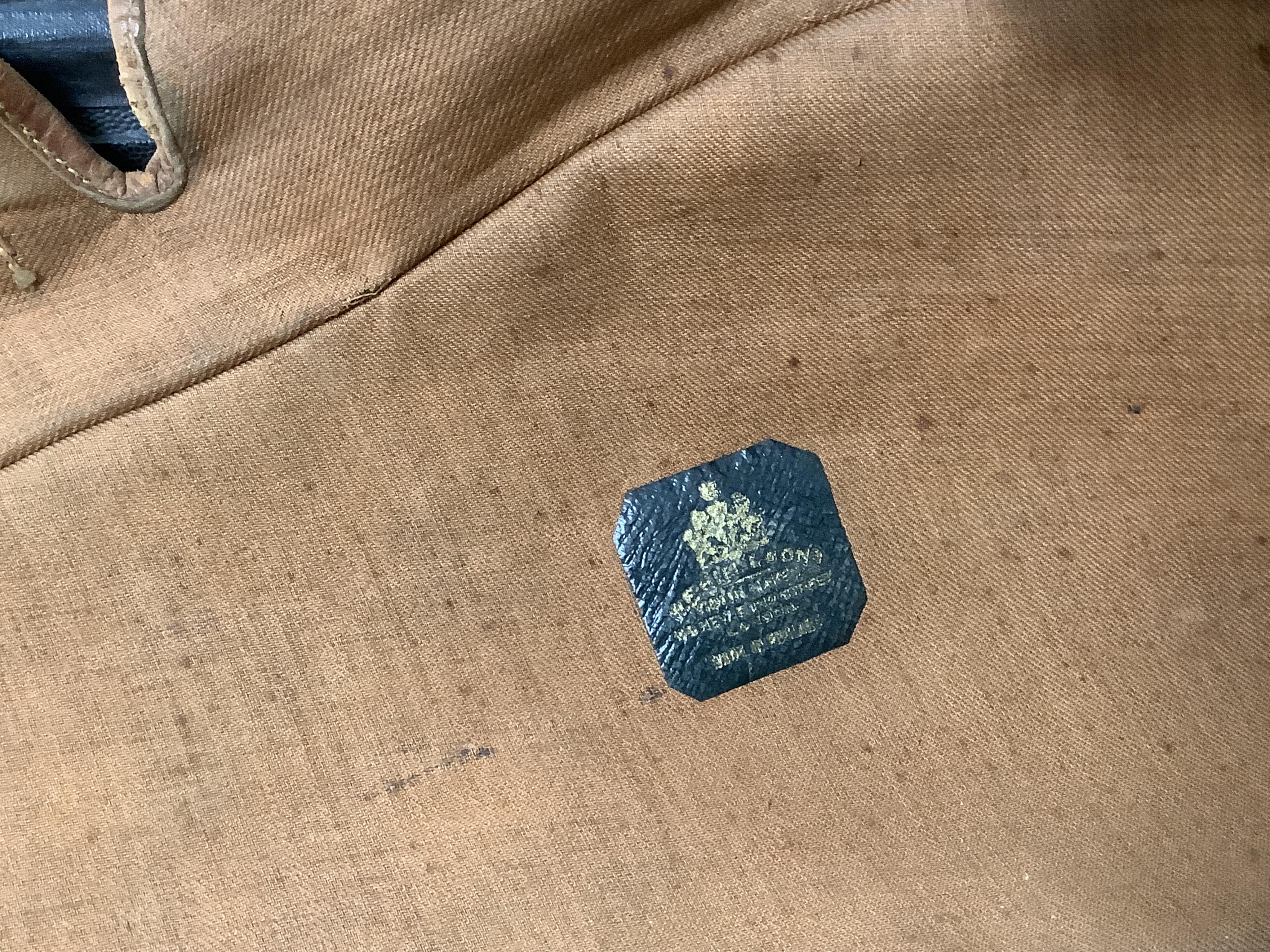 A late 19th century German violin in a Hill & Son oak case, with Hill canvas slip cover, together with an unbranded silver mounted bow, and another, ivory submission ref: 9HJU3B45 and ZC2E1GCP